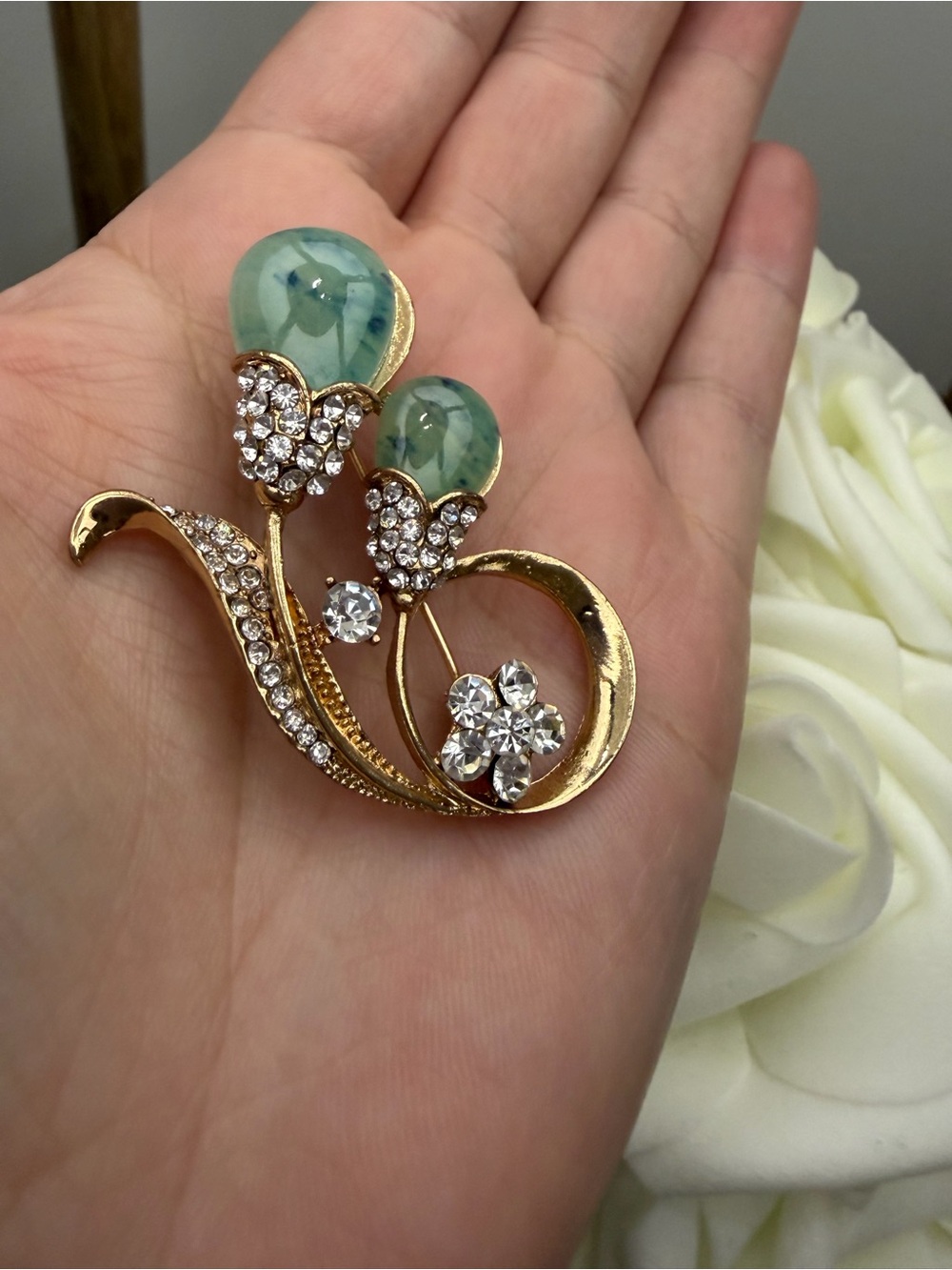 Vintage unique gold Tone Floral Brooch with Green Glass Accents